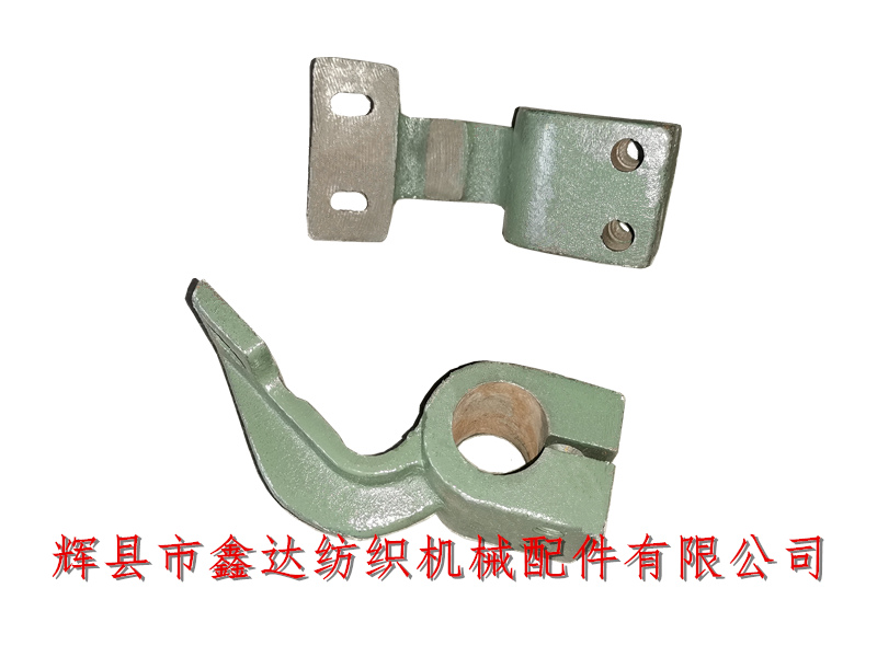 Weaving machine reed clamp shaft middle support foot